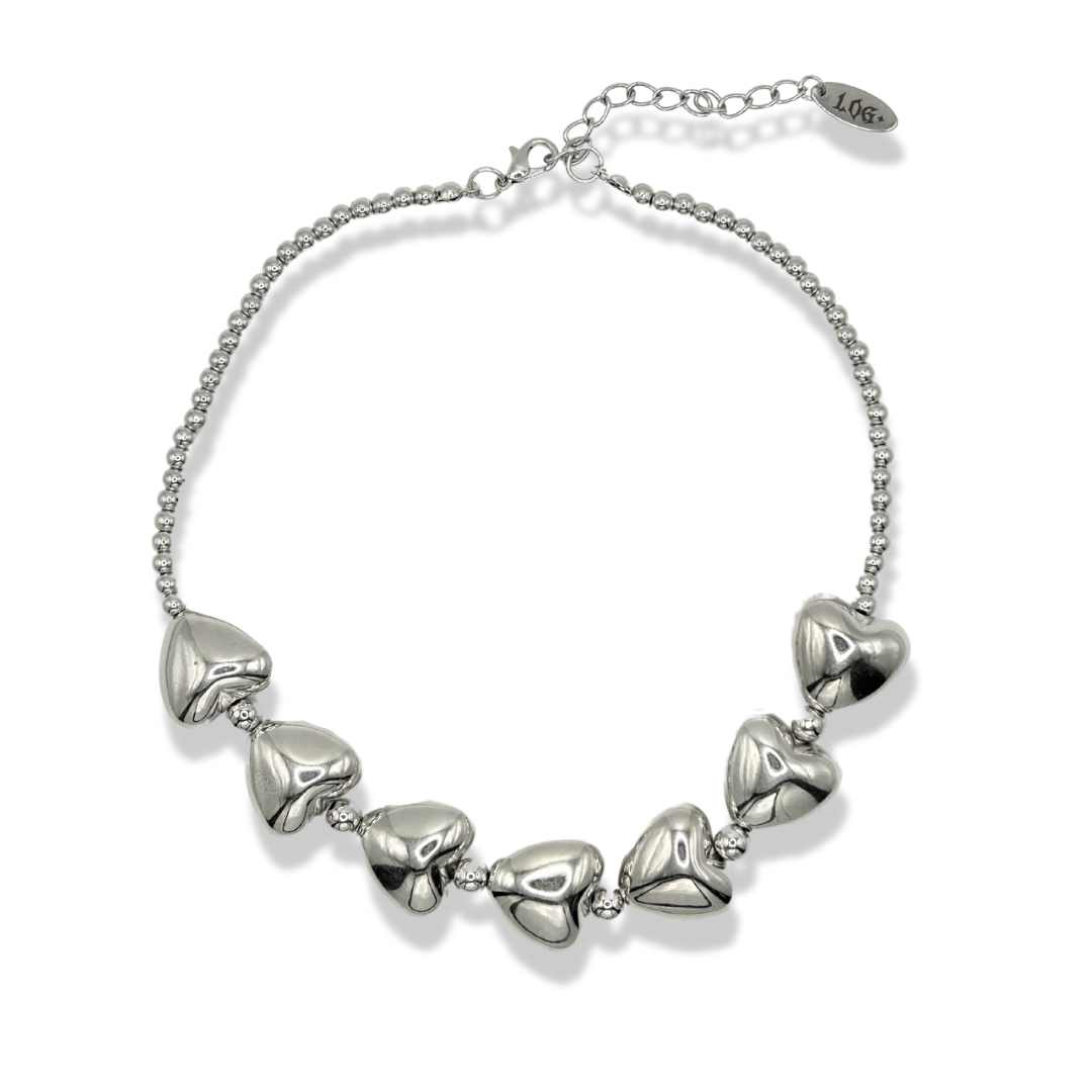 a metallic silver bubble heart beaded choker necklace
