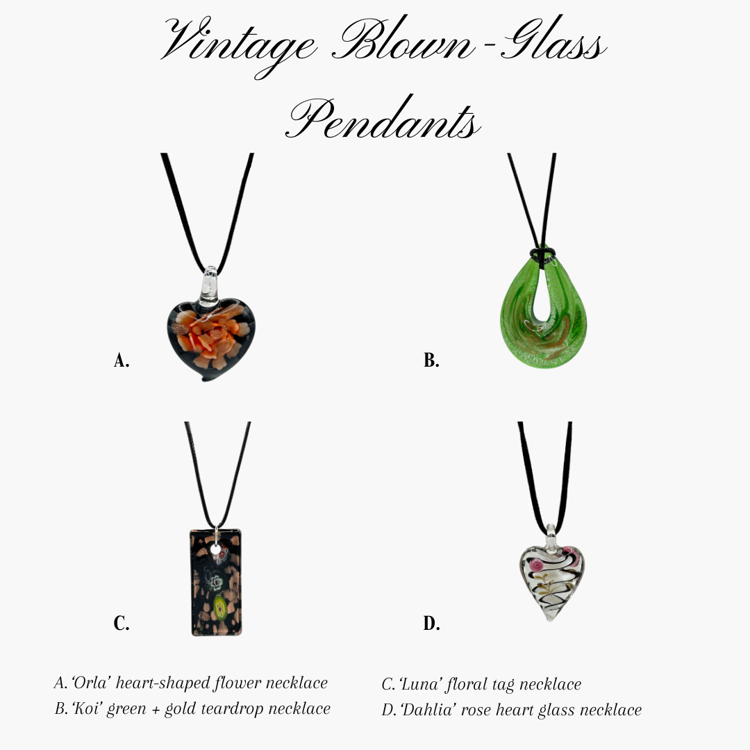 Group of blown glass, floral pendants in shapes of love hearts.