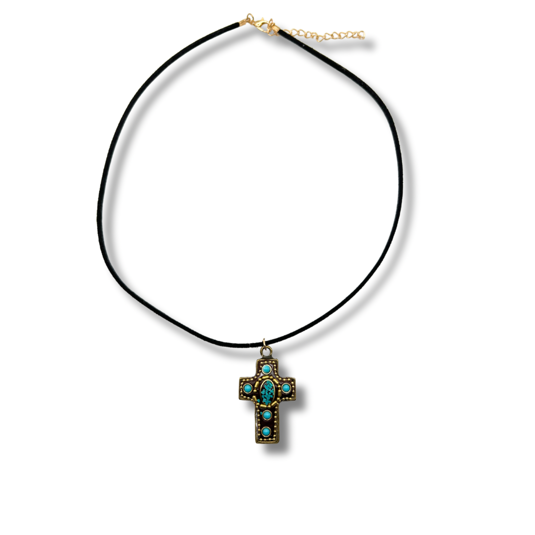 a gold and turquoise vintage-inspired cross pendant on a black cord chain