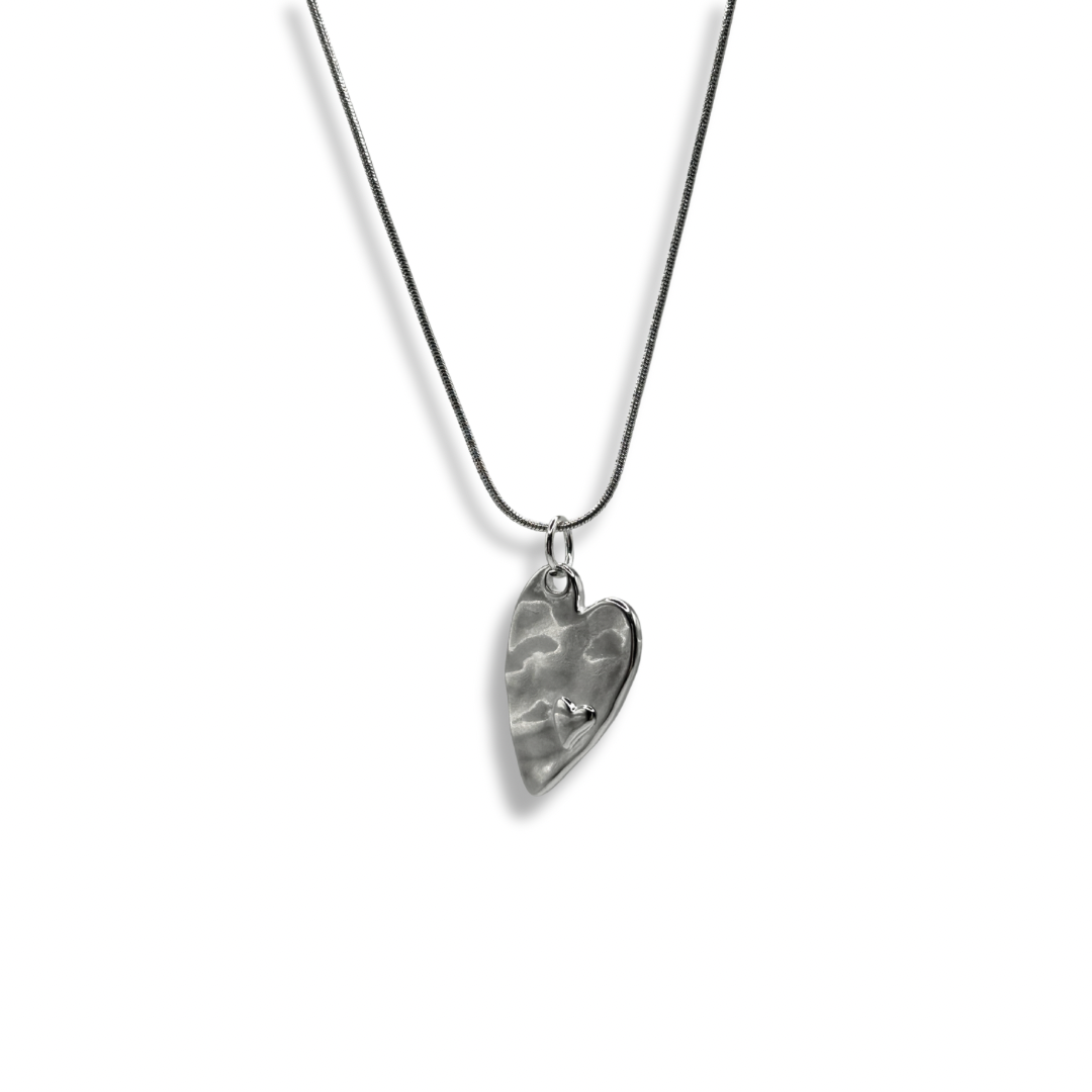 Hammered silver heart necklace jewellery on suede cord