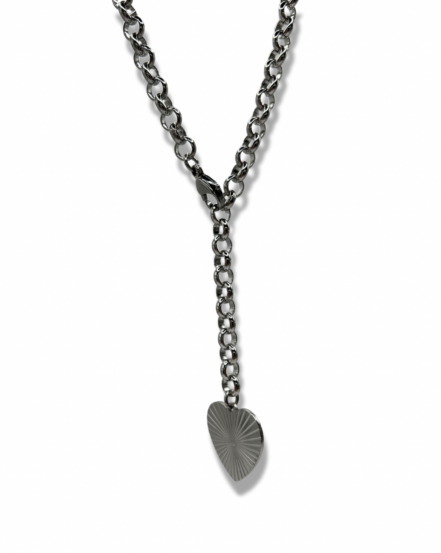 a chunky heart pendant chain, on the heart pendant is a rising sun design. the metal is stainless steel