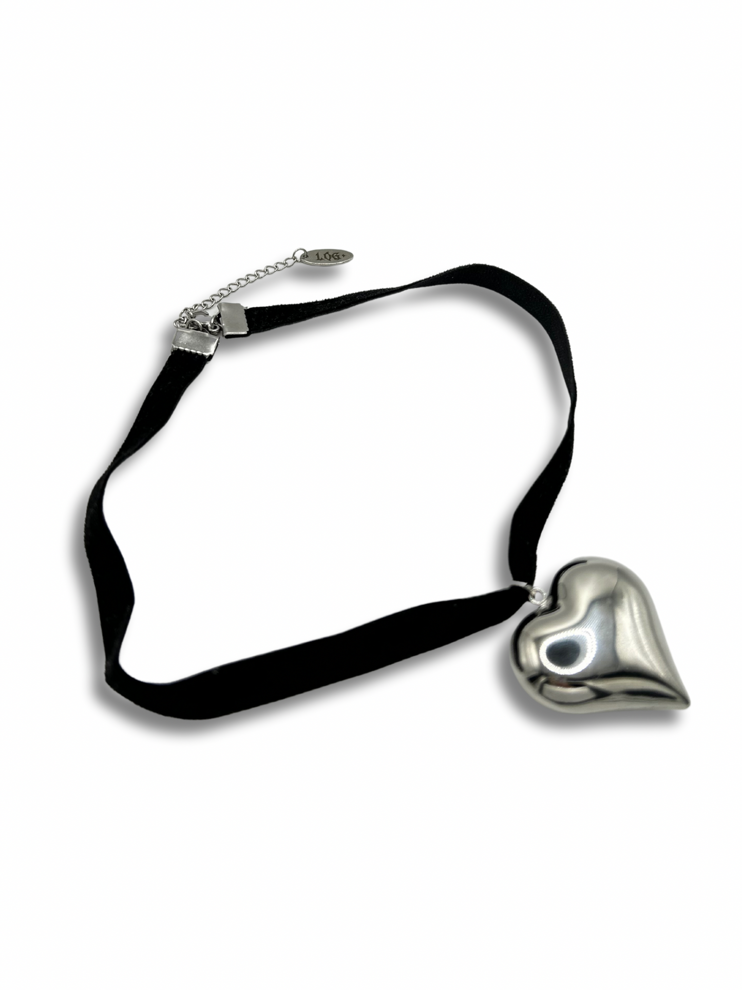 A black velvet ribbon choker with a large silver heart attached