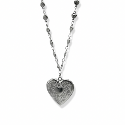 Vintage heart necklace on white background